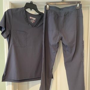 Grey’s Anatomy by Barco. Scrub top- size small; bottoms are XS.